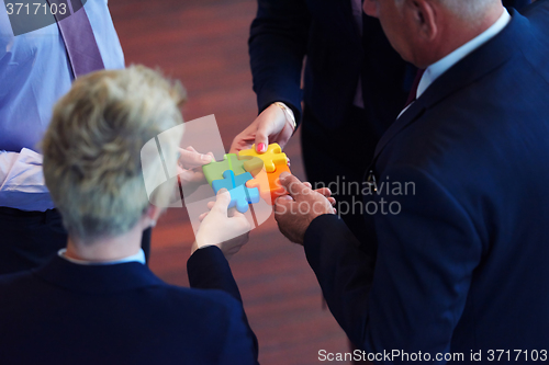 Image of assembling jigsaw puzzle