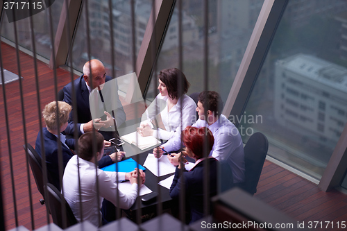 Image of business people group on meeting at modern bright office