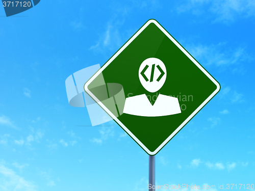 Image of Programming concept: Programmer on road sign background