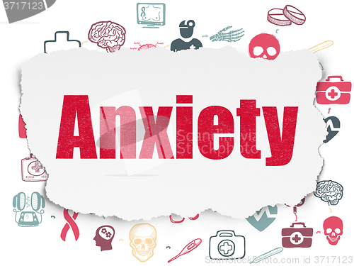 Image of Medicine concept: Anxiety on Torn Paper background