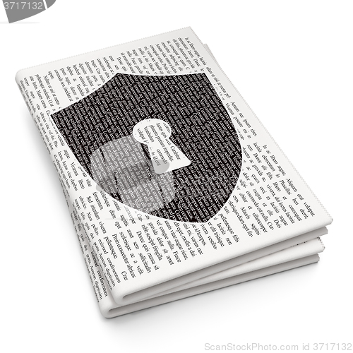 Image of Privacy concept: Shield With Keyhole on Newspaper background