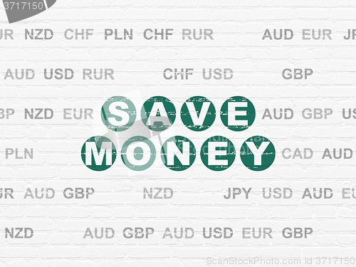 Image of Currency concept: Save Money on wall background
