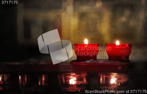 Image of Candle burning in church - Vintage dirty look