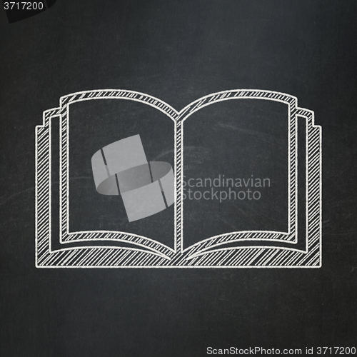 Image of Learning concept: Book on chalkboard background