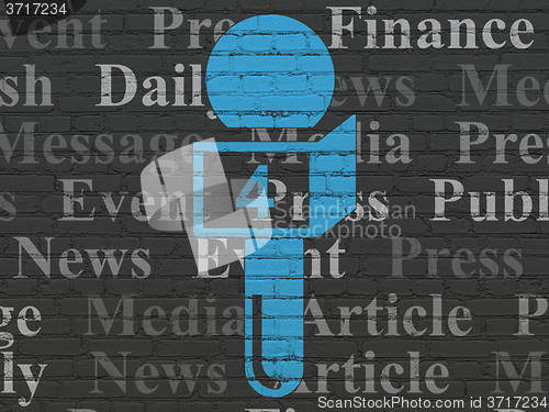 Image of News concept: Microphone on wall background