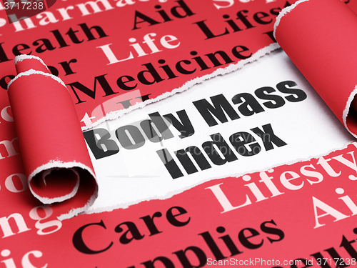 Image of Medicine concept: black text Body Mass Index under the piece of  torn paper
