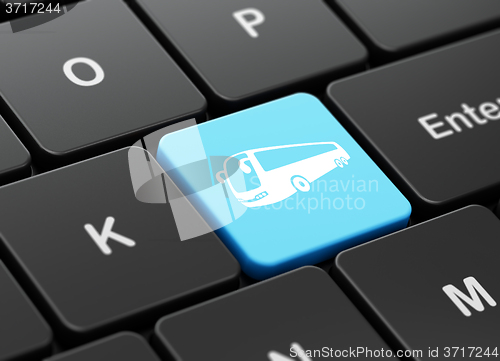 Image of Travel concept: Bus on computer keyboard background