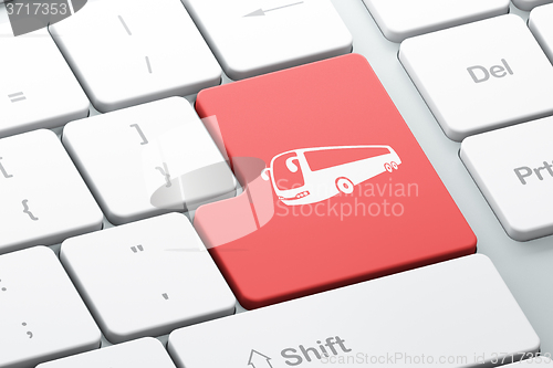 Image of Tourism concept: Bus on computer keyboard background