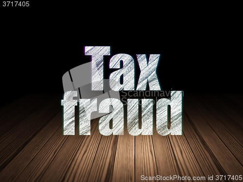 Image of Law concept: Tax Fraud in grunge dark room