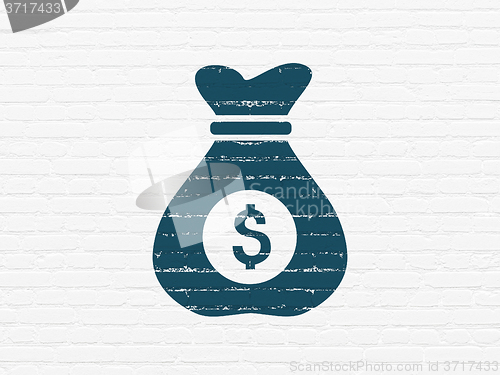 Image of Finance concept: Money Bag on wall background