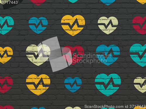 Image of Healthcare concept: Heart icons on wall background