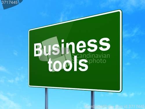 Image of Finance concept: Business Tools on road sign background
