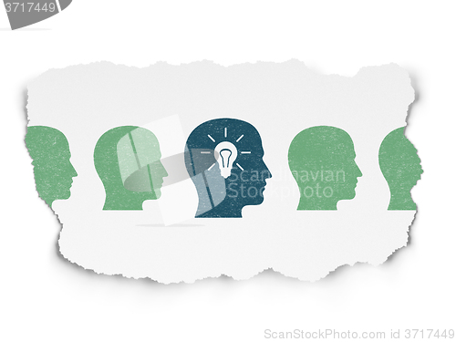 Image of Business concept: head with light bulb icon on Torn Paper background