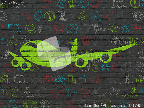 Image of Tourism concept: Airplane on wall background