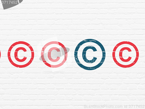 Image of Law concept: copyright icon on wall background