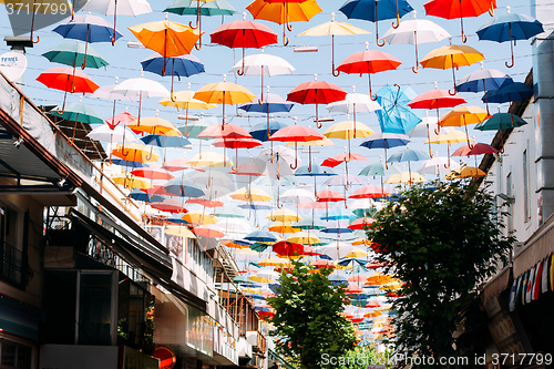 Image of Umbrellas in the sky of Antalya, as a city tourist attraction.