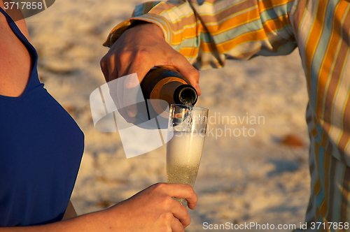 Image of champagne at sunset