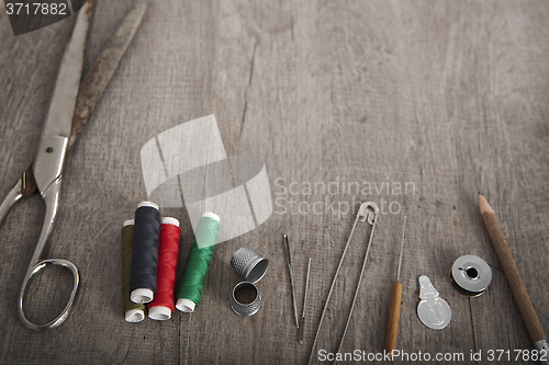 Image of sewing wooden background