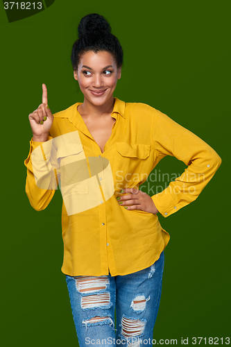 Image of Woman pointing her finger up
