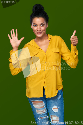 Image of Woman showing six fingers