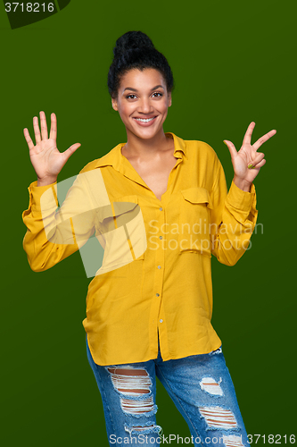 Image of Woman showing eight fingers