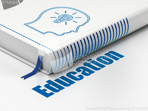 Image of Studying concept: book Head With Lightbulb, Education on white background