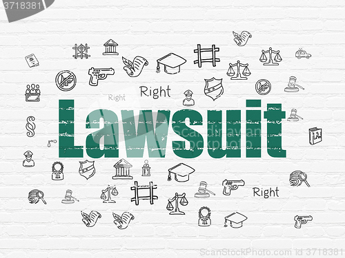 Image of Law concept: Lawsuit on wall background