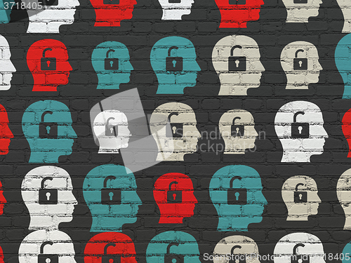 Image of Finance concept: Head With Padlock icons on wall background