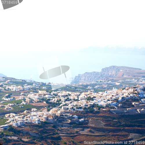 Image of in cyclades greece santorini europe the sky sea and village from