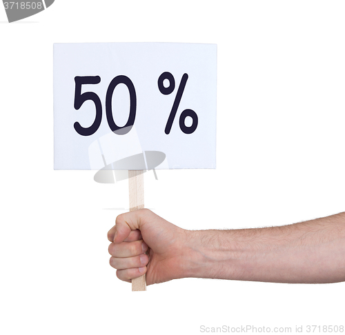 Image of Sale - Hand holding sigh that says 50%