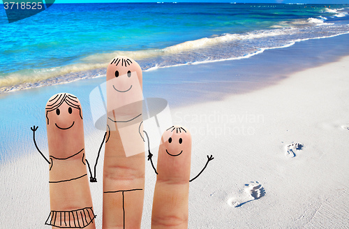 Image of Family on the beach. Exotic vacation