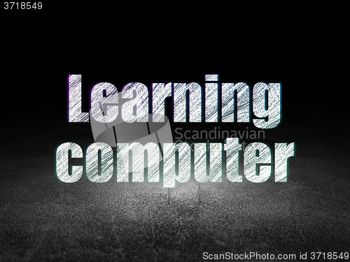 Image of Studying concept: Learning Computer in grunge dark room
