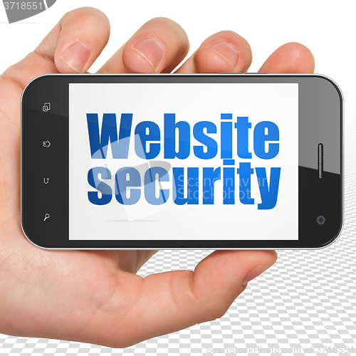 Image of Web design concept: Hand Holding Smartphone with Website Security on display