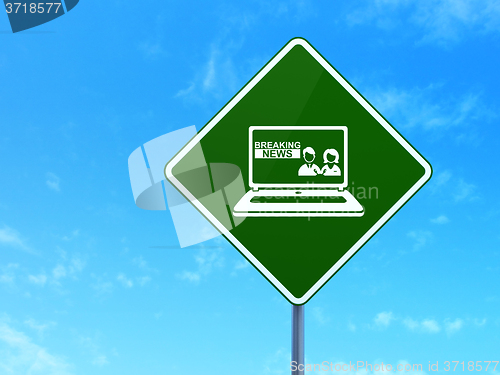 Image of News concept: Breaking News On Laptop on road sign background
