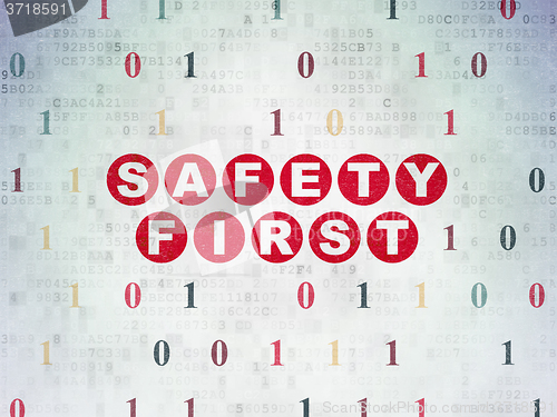 Image of Safety concept: Safety First on Digital Paper background