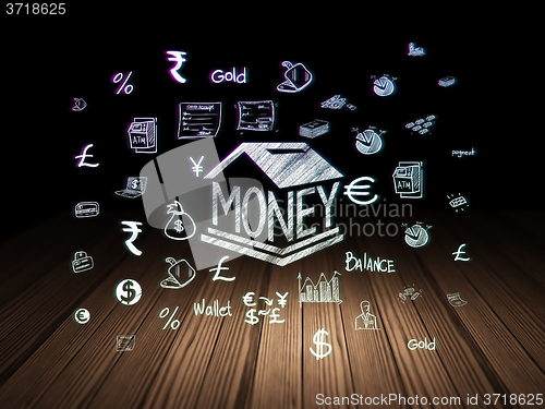 Image of Currency concept: Money Box in grunge dark room