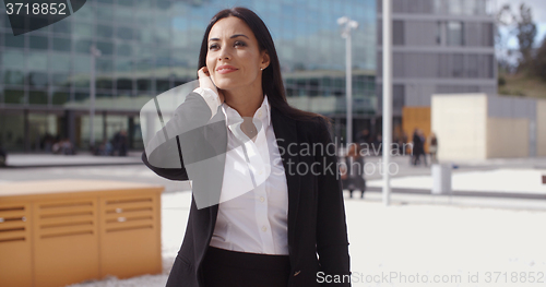 Image of Stylish businesswoman waiting for someone