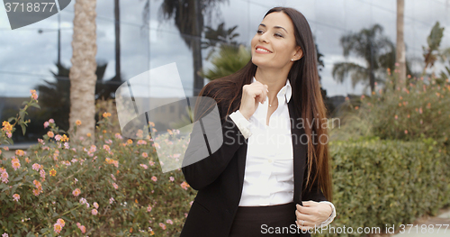 Image of Attractive stylish woman waiting for a friend