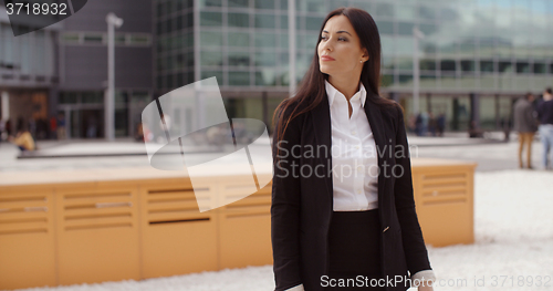 Image of Stylish businesswoman waiting for someone