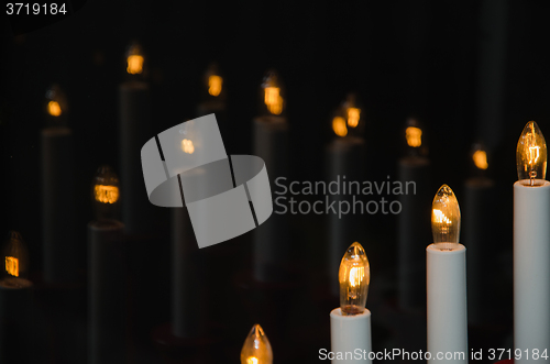 Image of Reflecting electric candles