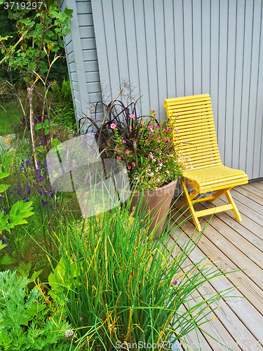 Image of Summer patio decorated with flowers