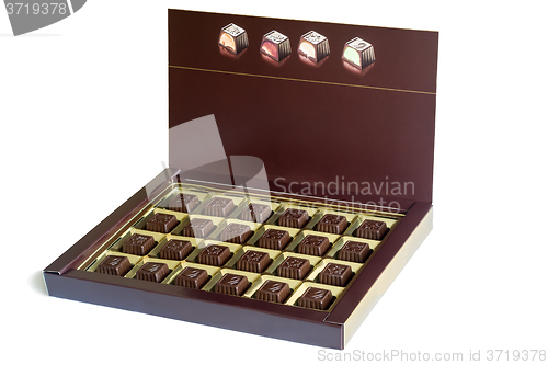 Image of An open box of chocolates on a white background.