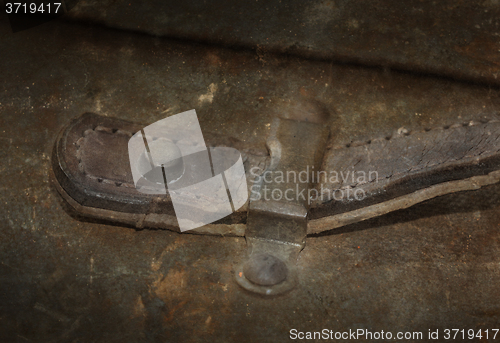 Image of Old canvas trunk handle close up