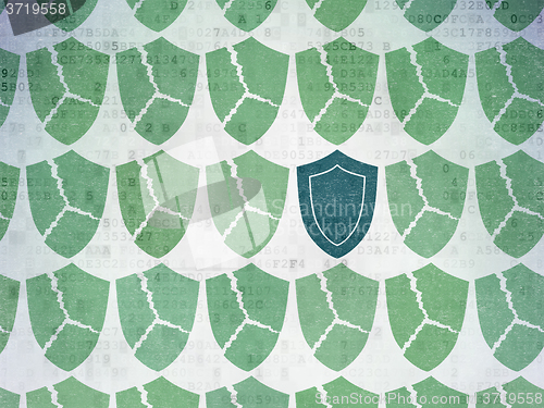 Image of Privacy concept: shield icon on Digital Paper background