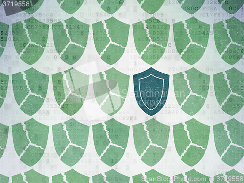 Image of Privacy concept: shield icon on Digital Paper background
