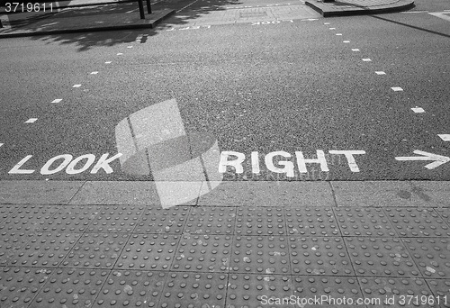 Image of Black and white Look Right sign