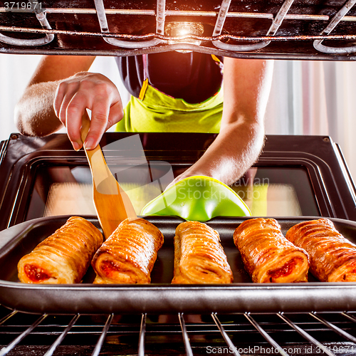 Image of Cooking in the oven at home.