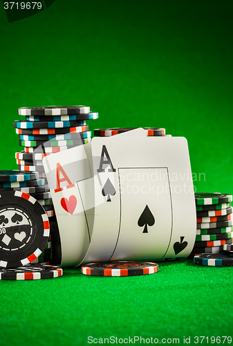 Image of chips and two aces