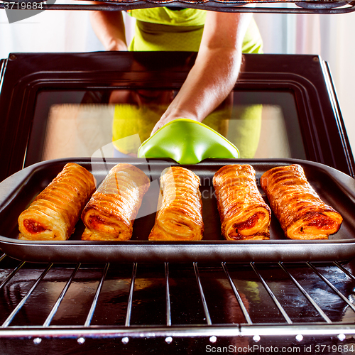 Image of Cooking in the oven at home.