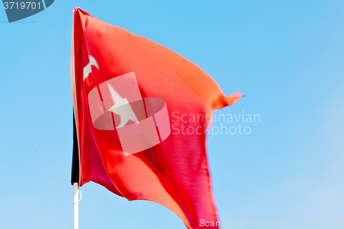 Image of tunisia  waving flag in the    colour and wave